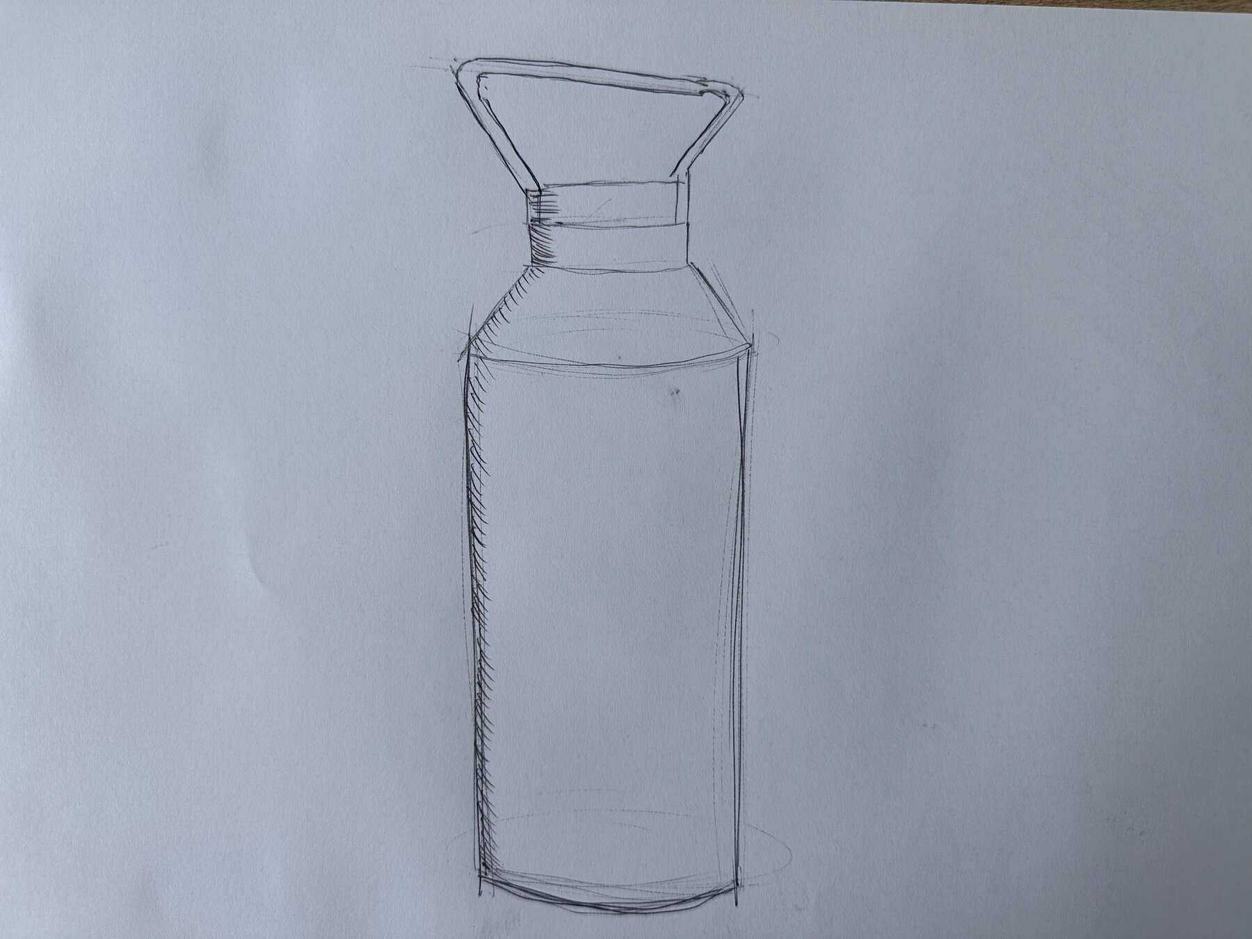 Sketch analysis of a Patagonia-style tool, a rectangular metal body with a moulded plastic handle